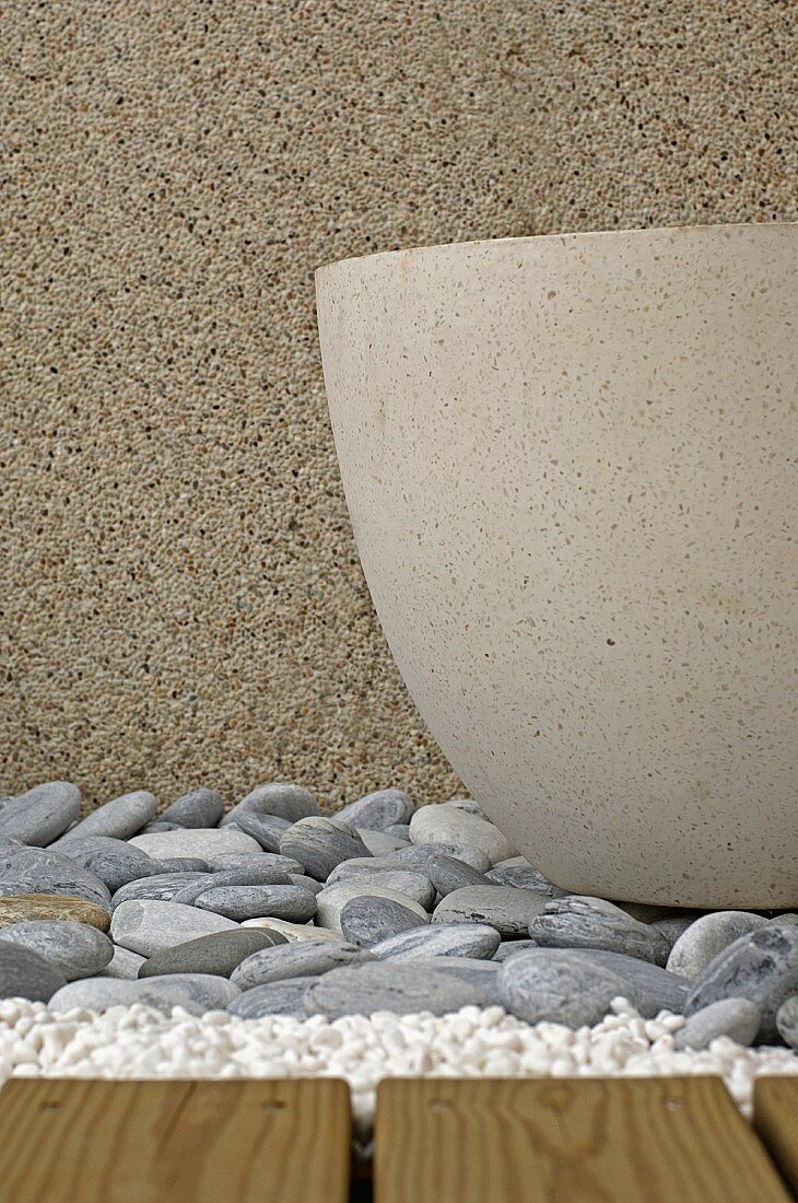 Concrete pot on stones detail