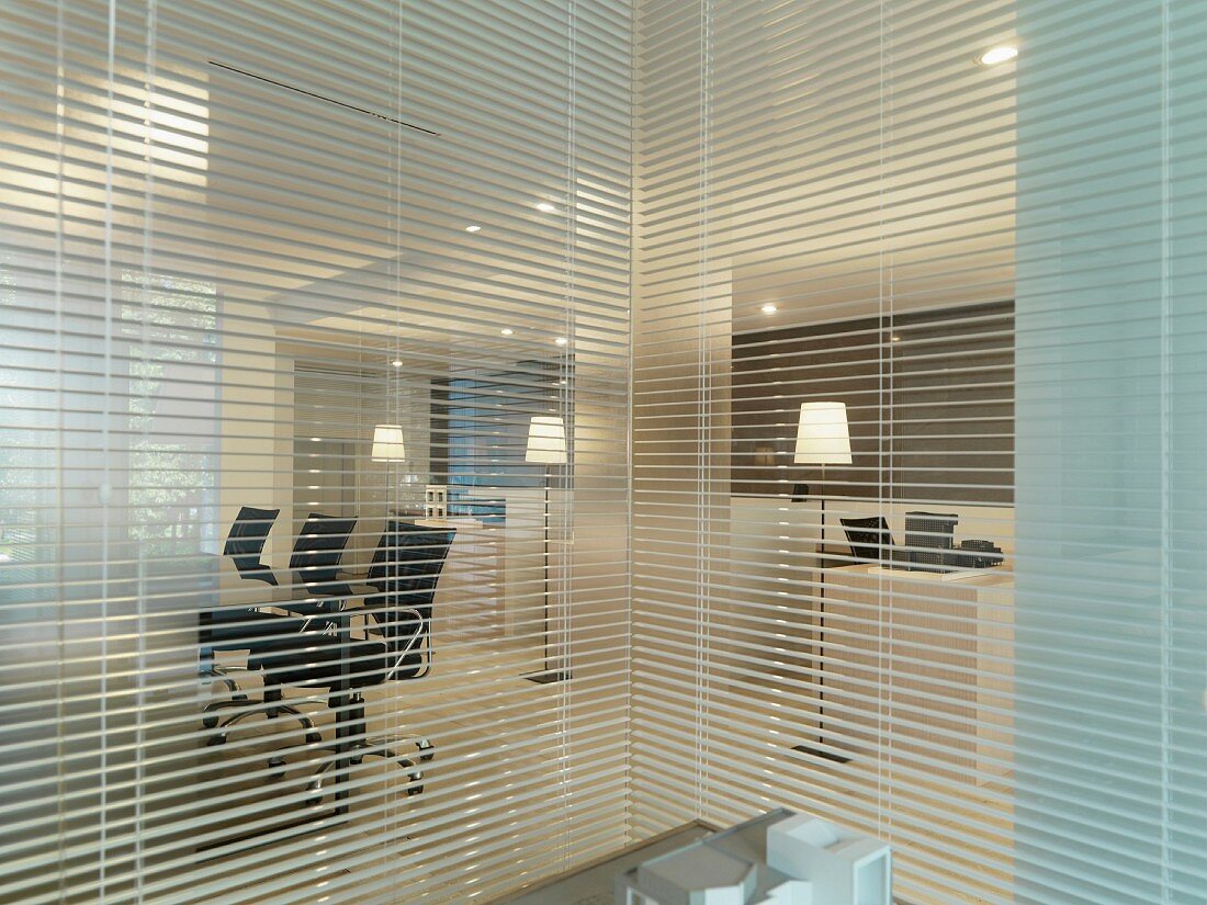Blinds separating offices in modern office