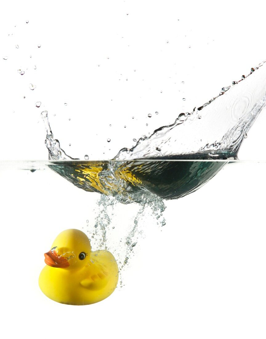 Rubber ducky falling into water