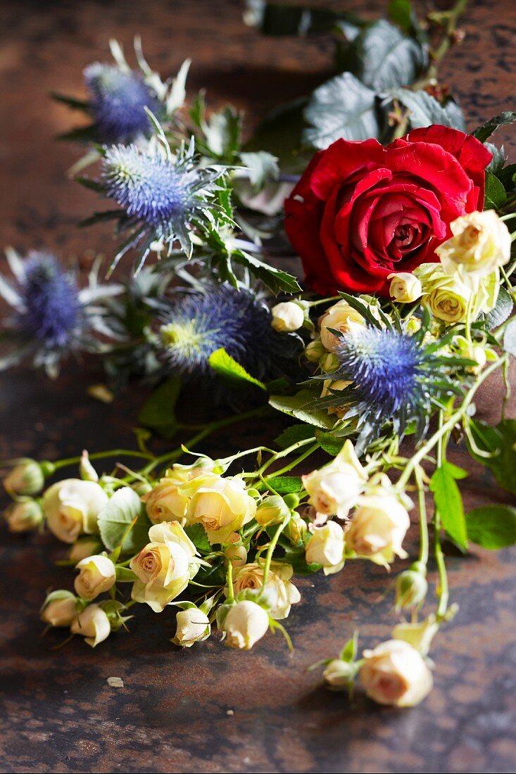 Bouquet of flowers with roses and thistles