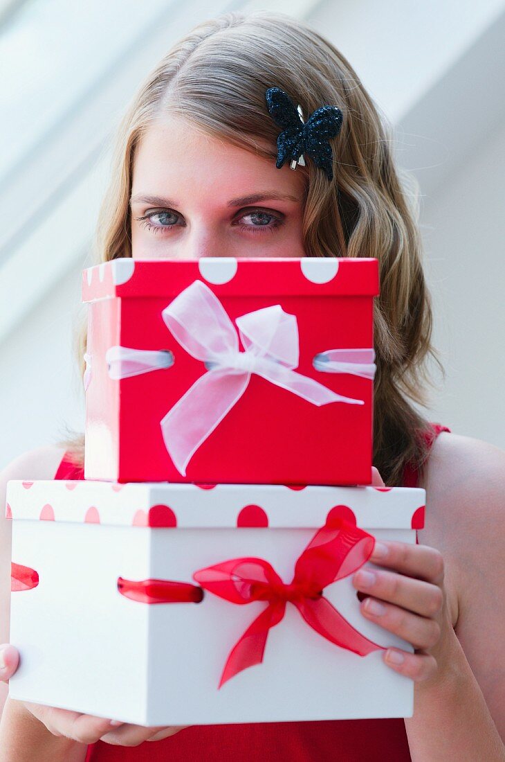 Girl holding presents
