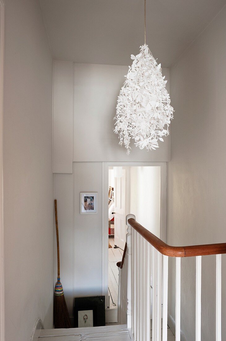 Midsummer paper lamp shade by Tord Boontje in staircase hallway