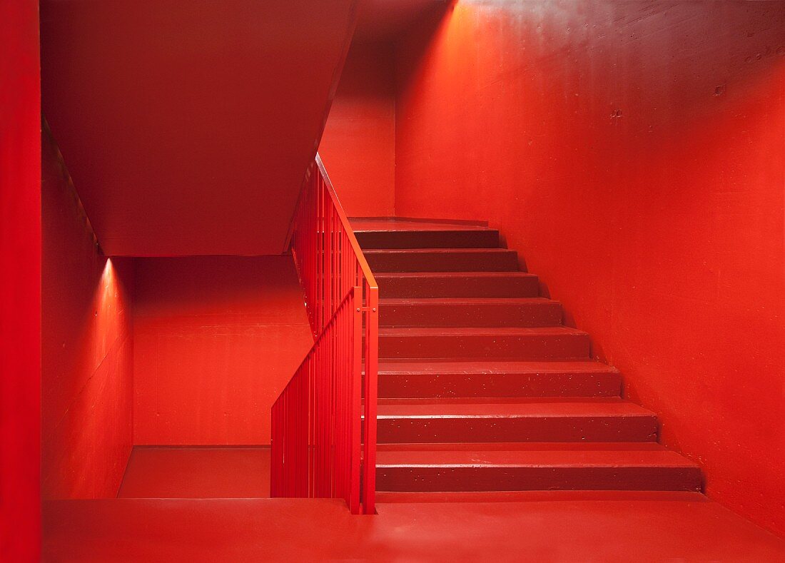 Vibrant red, monochrome staircase