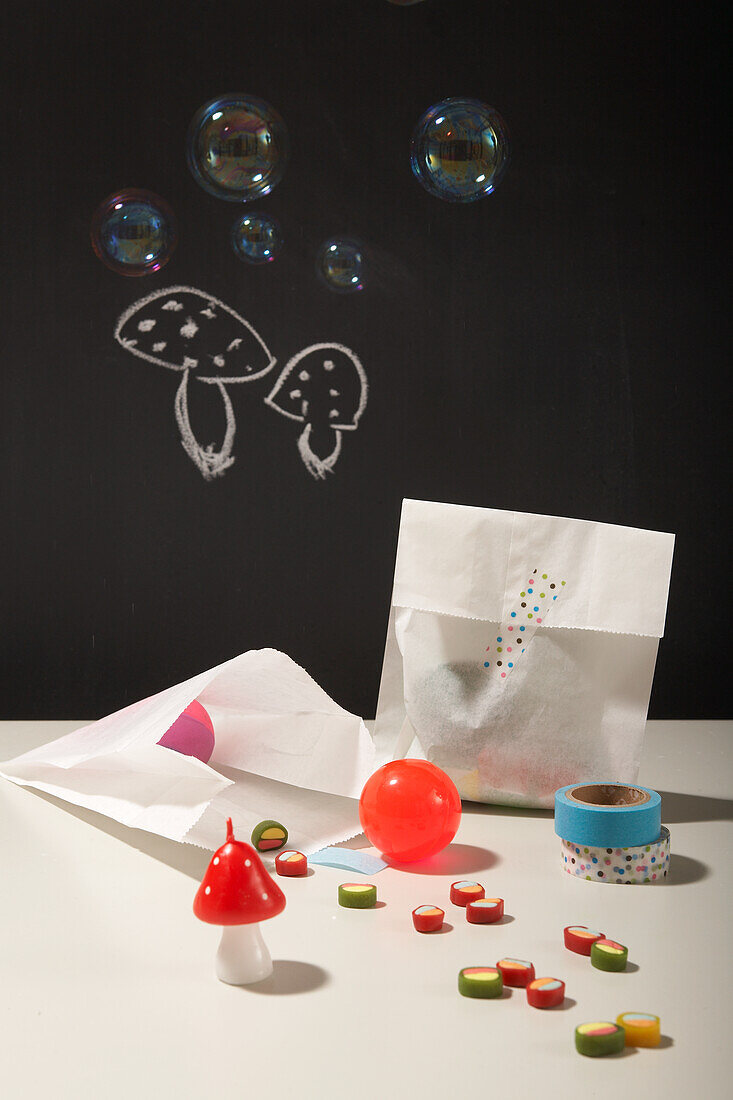 Soap bubbles, drawing of toadstools and colourful washi tape with sweets