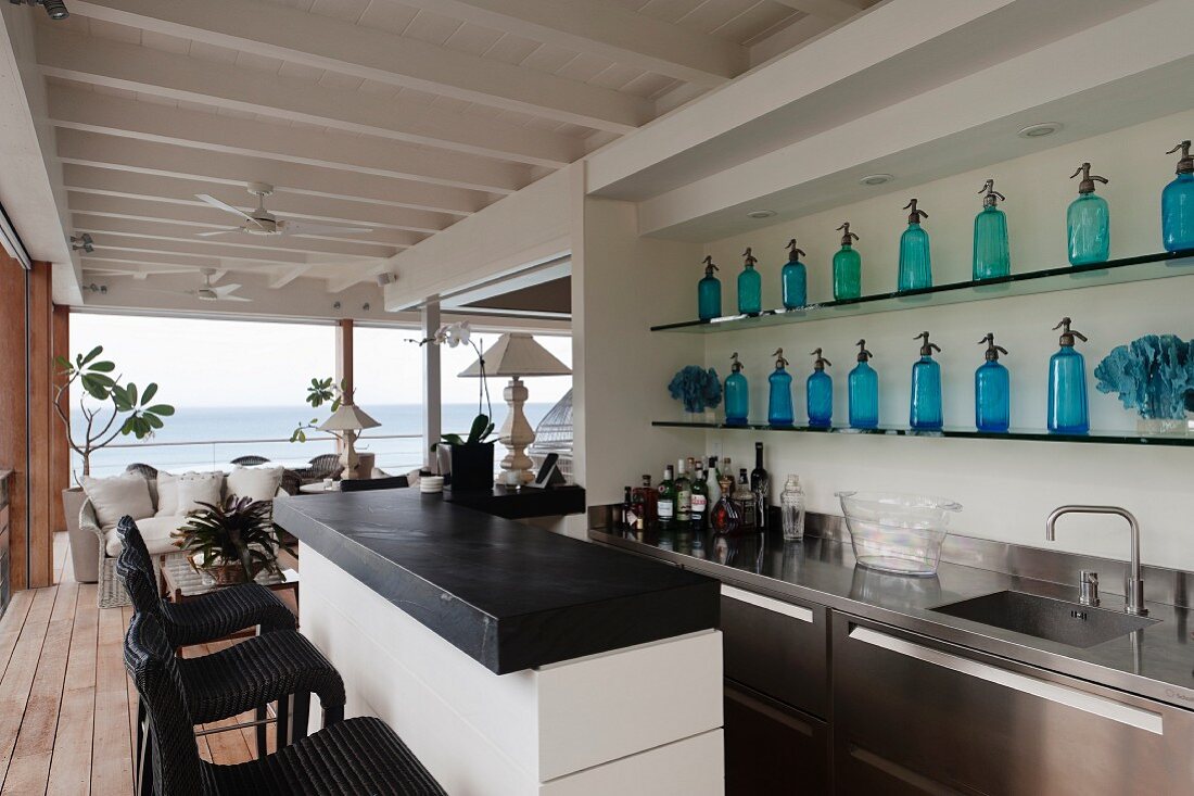 Open-plan bar with sea view