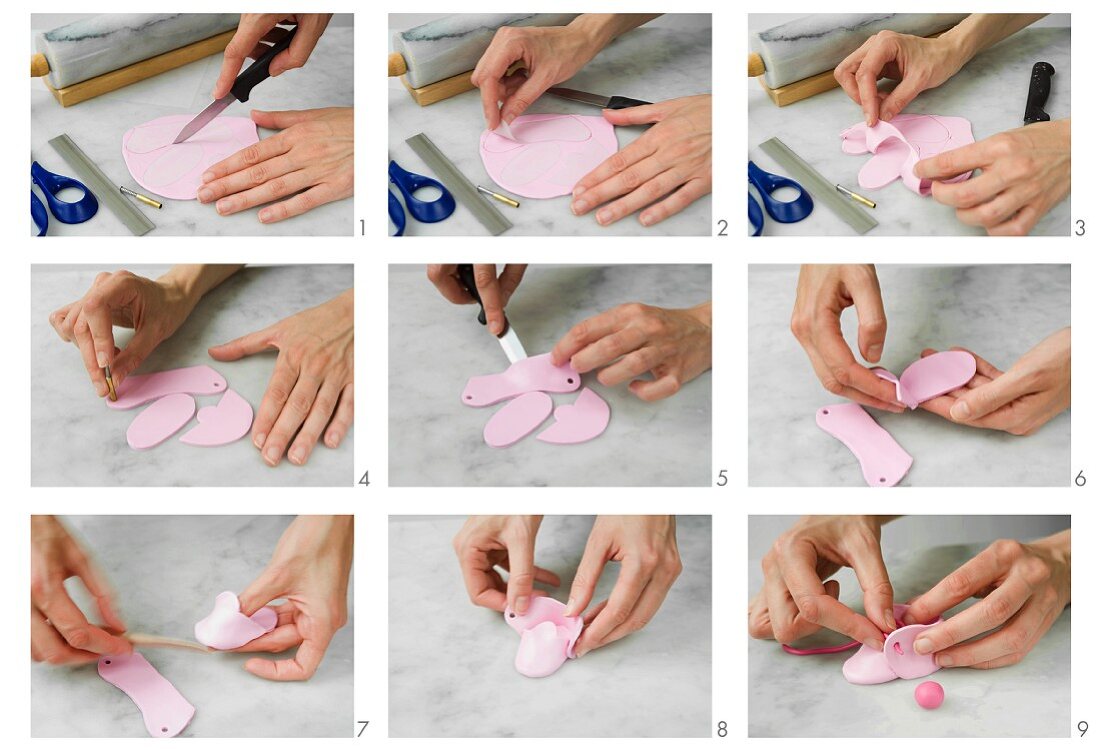 Pink bootees being made from modelling clay or fondant
