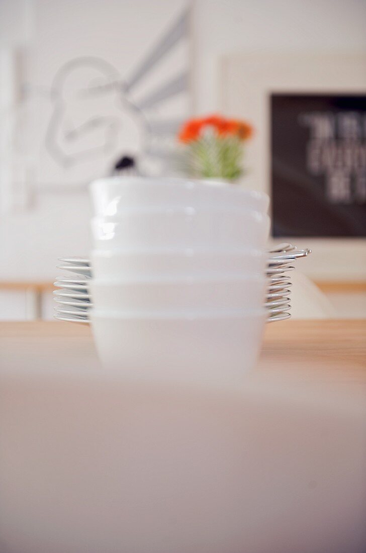 Dishes and plates stacked on table