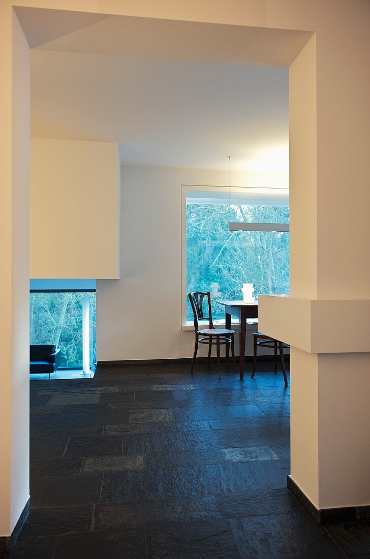 Open-plan living-dining room with Norwegian slate floor