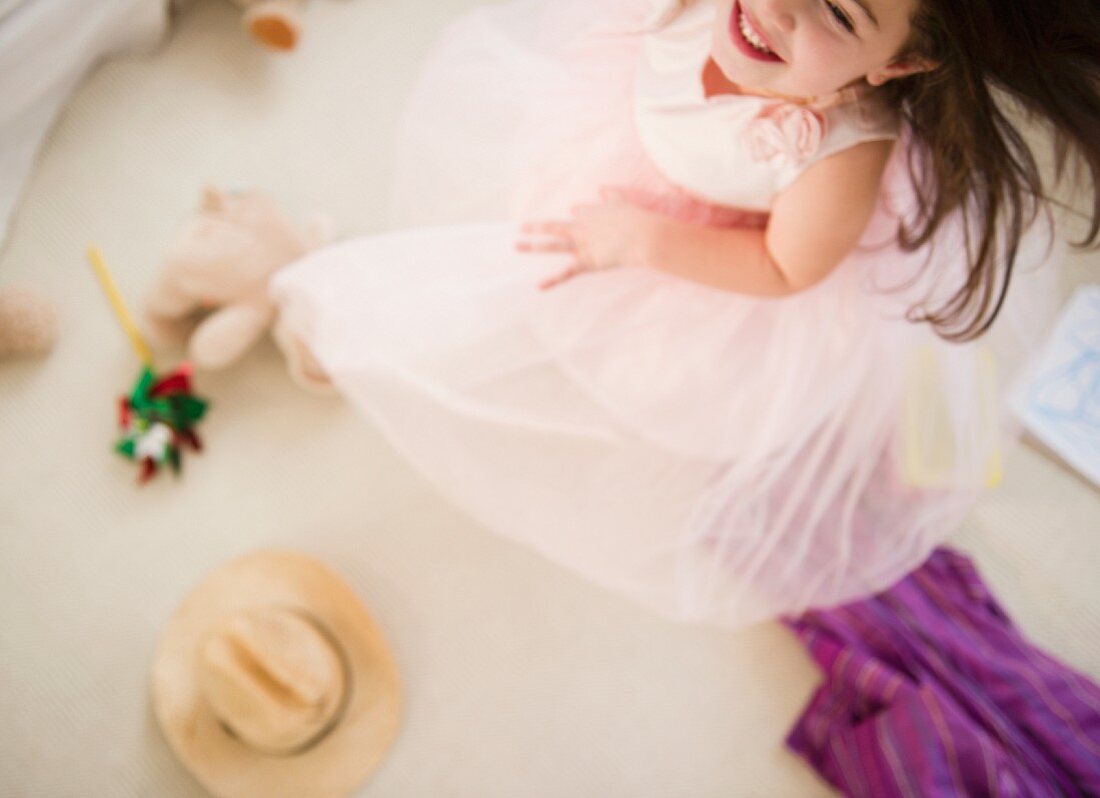 Small girl (4-5 years) dancing in tulle dress