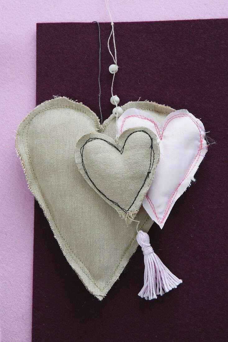 Hand-sewn linen hearts and hand-made tassel