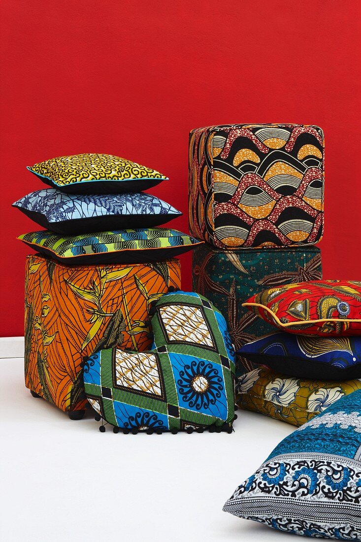 Cushions and pouffes with colourful covers