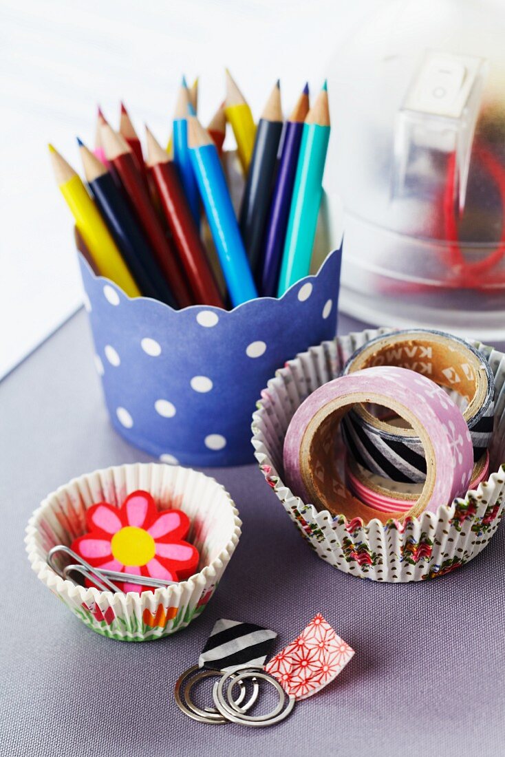 Pens and stationery in paper cake cases