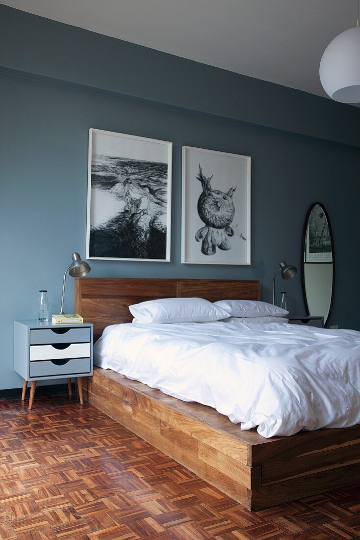 Bedroom with double bed on African Kiaat-wood parquet