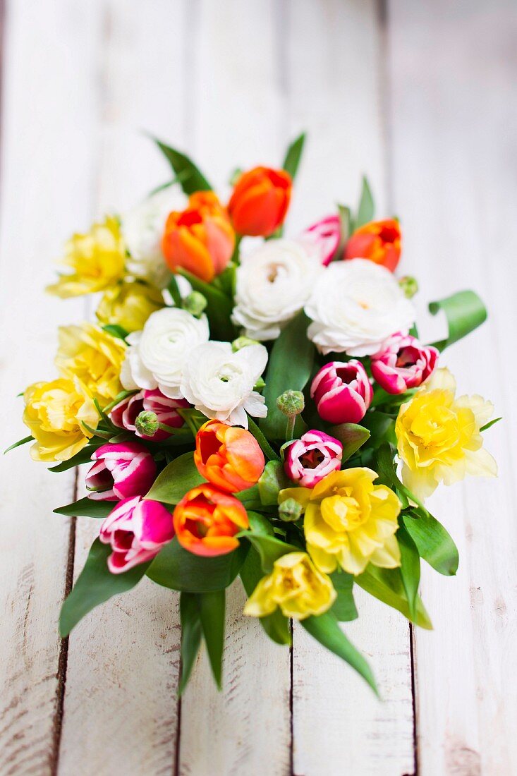 A springtime bouquet with tulips and ranunculus