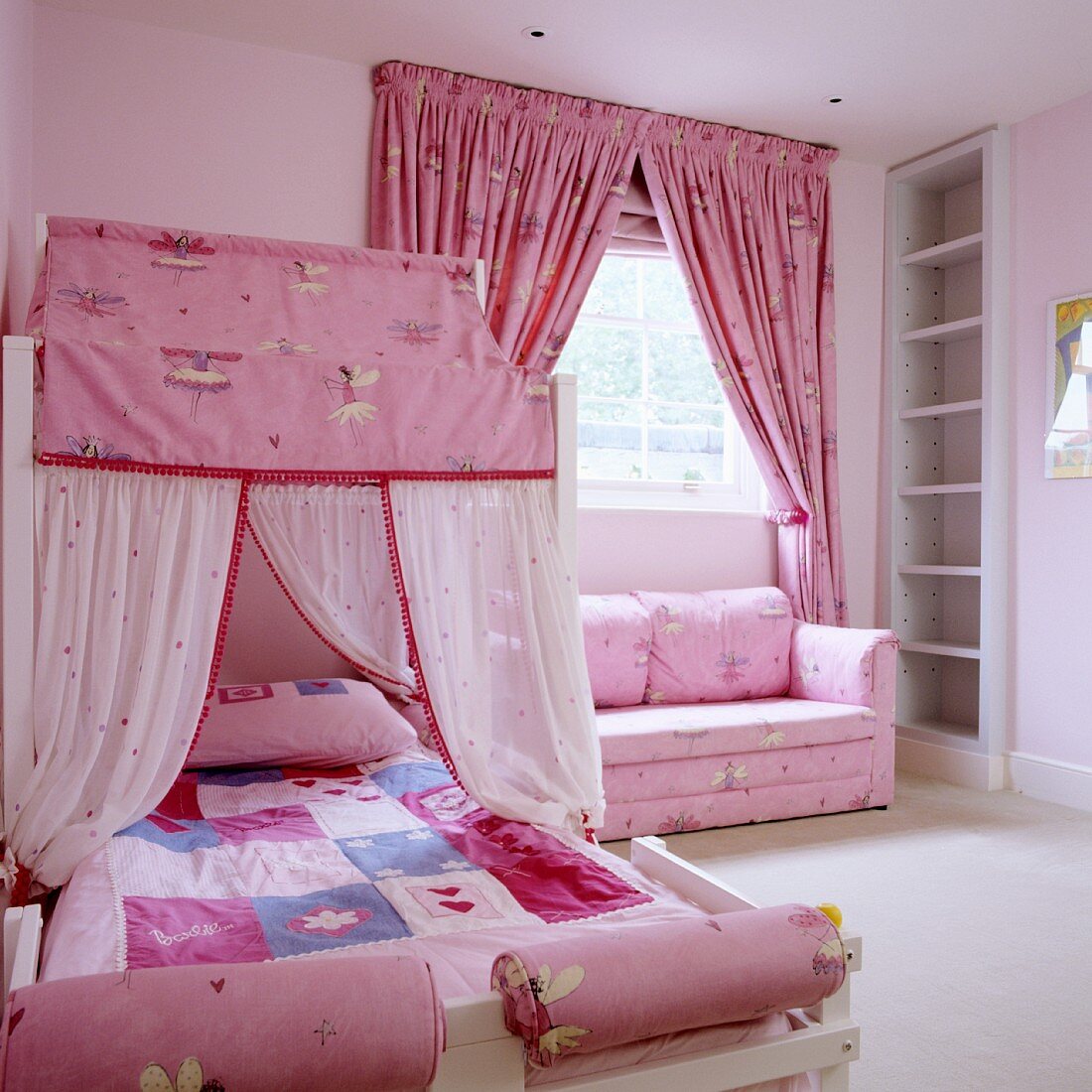 Little girl's bedroom in pink with fairy-tale elements