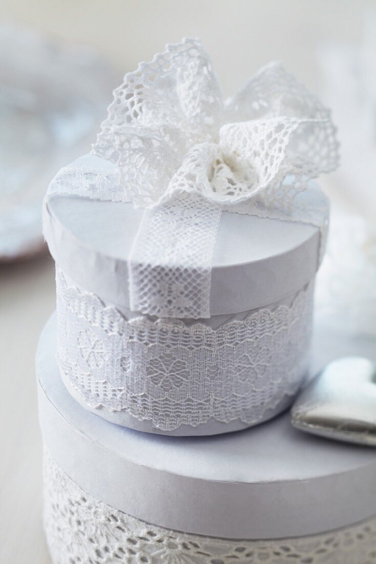 Gift boxes decorated with lace trim and lace flower