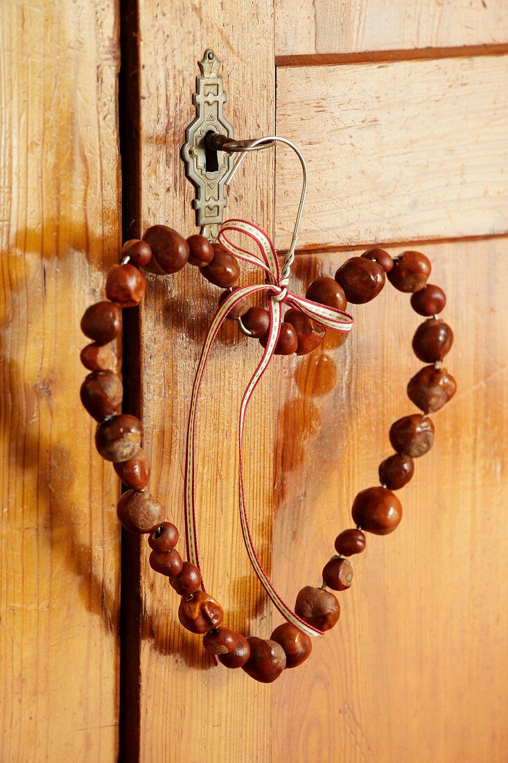 Heart-shaped wreath of horse chestnuts