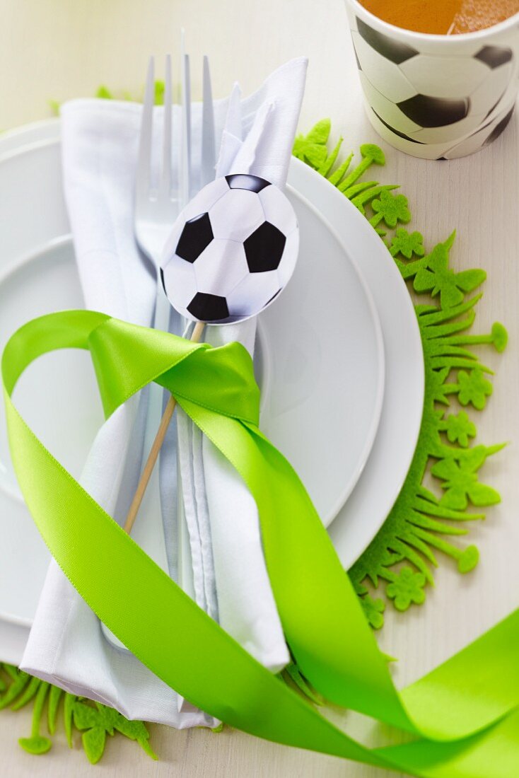 A place setting at a football-themed party