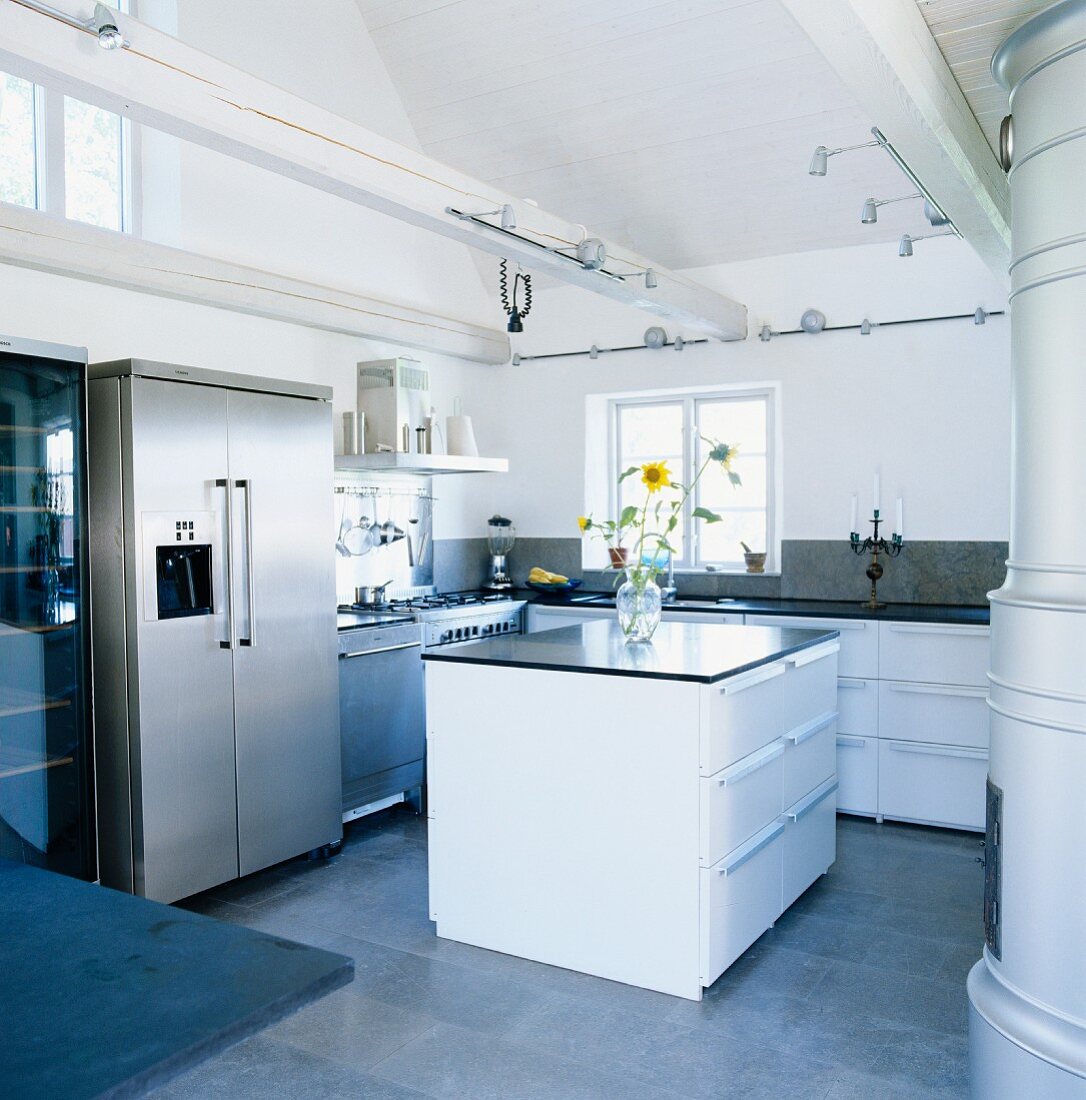 Modern fitted kitchen with island counter