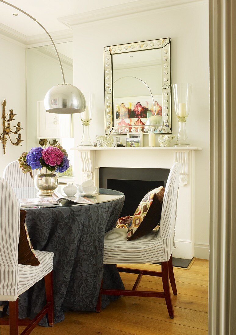 Dining Area With Grey Damask Tablecloth, Mirror Above Dining Room Table