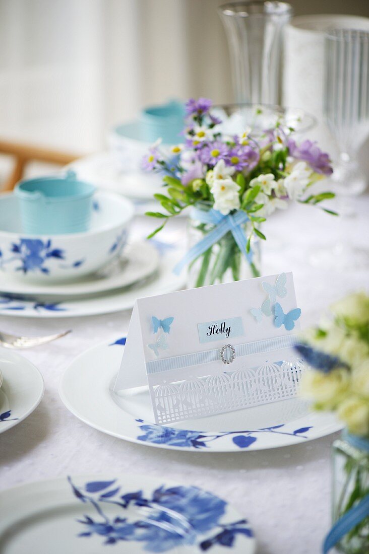 Place card name tag on set wedding reception table