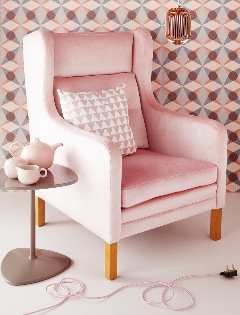 Delicate shades of pink and copper with geometric patterns; inviting elegance