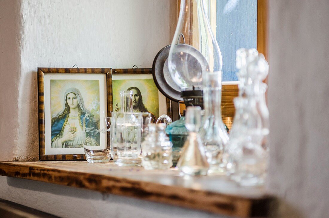 Windowsill decorated with religious icons in country-house style