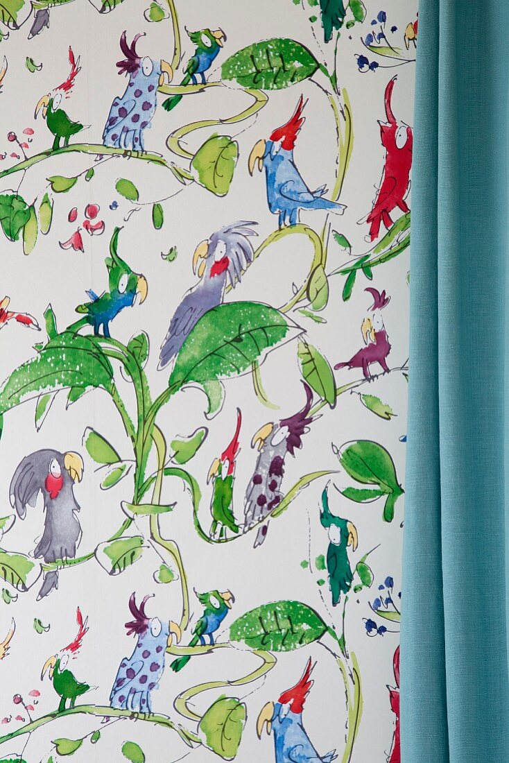 Detail of Quentin Blake 'Cockatoos' wallpaper and pastel blue curtain