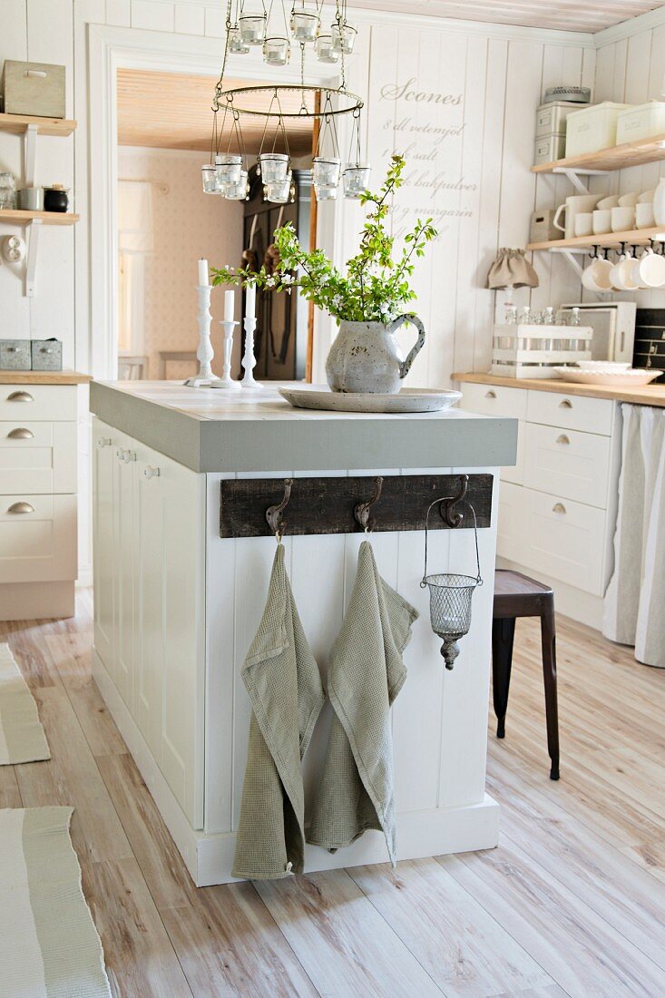Free-standing counter in white, country-house kitchen
