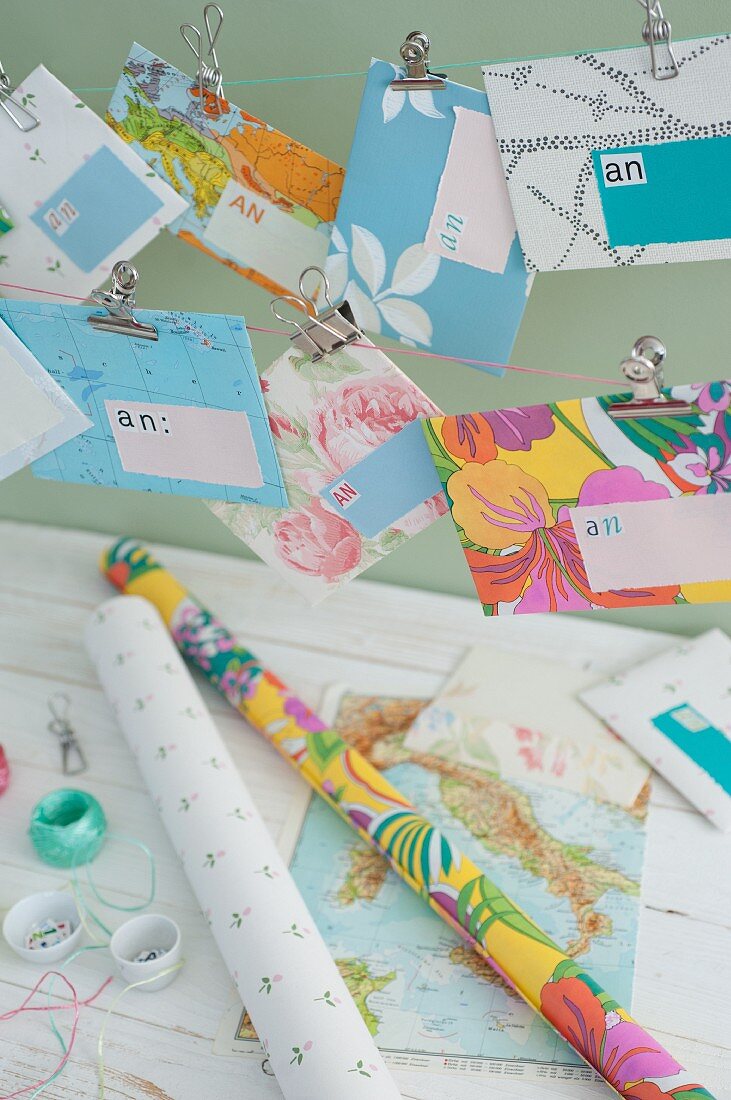 Envelopes hand crafted from gift wrap, wallpaper remnants and maps