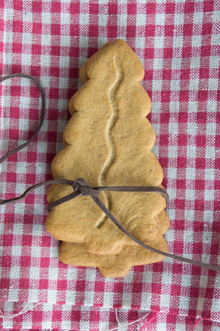 Almond biscuit Christmas tree on gingham cloth