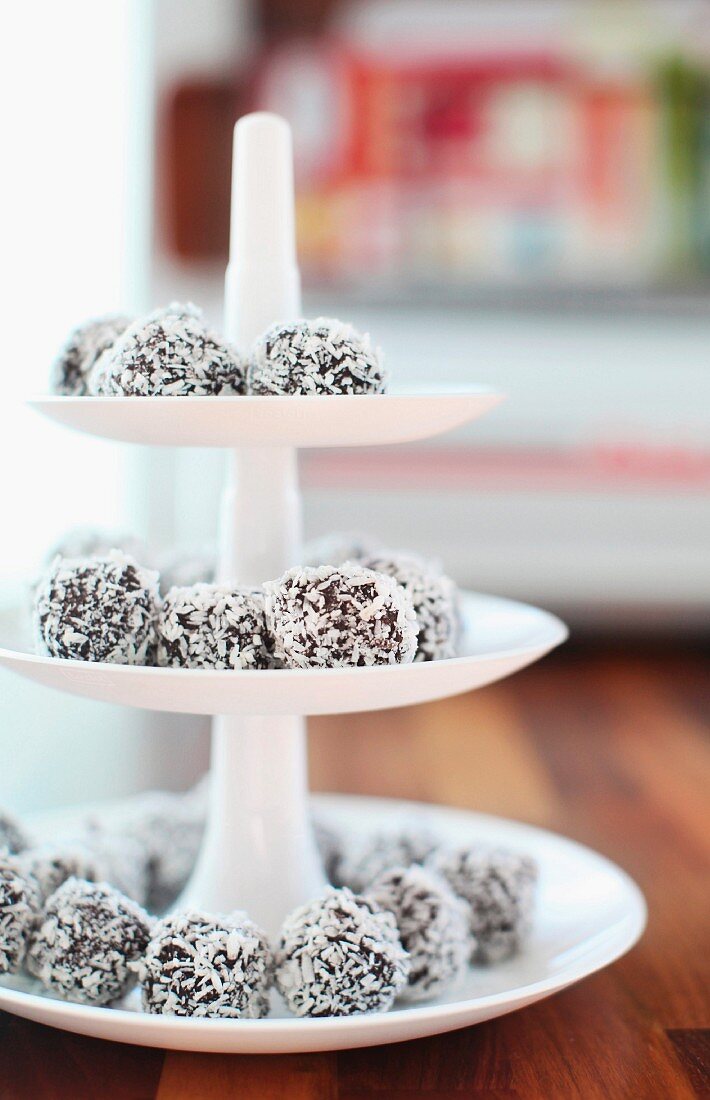 Coconut truffles on white, china cake stand