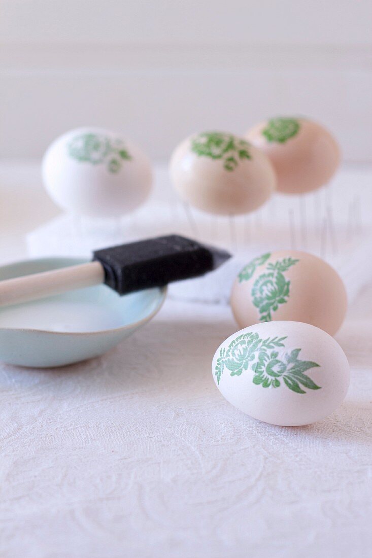 Decorating Easter eggs with botanical patterns using decoupage technique