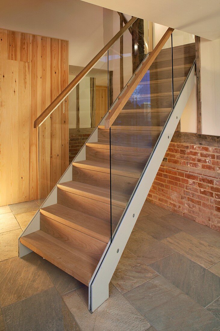 Stairs with glass banister in the lobby