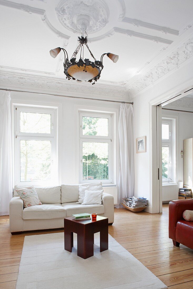 View of a living room with a stucco ceiling in an old apartment