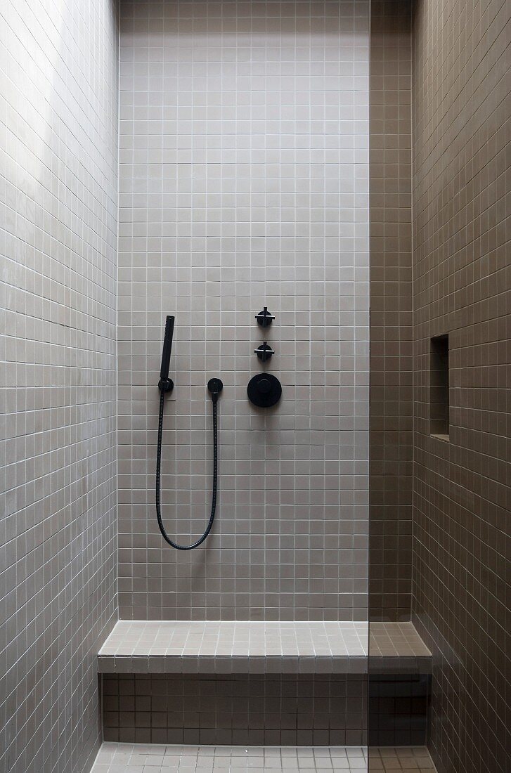 Tiled modern bathroom with purist look