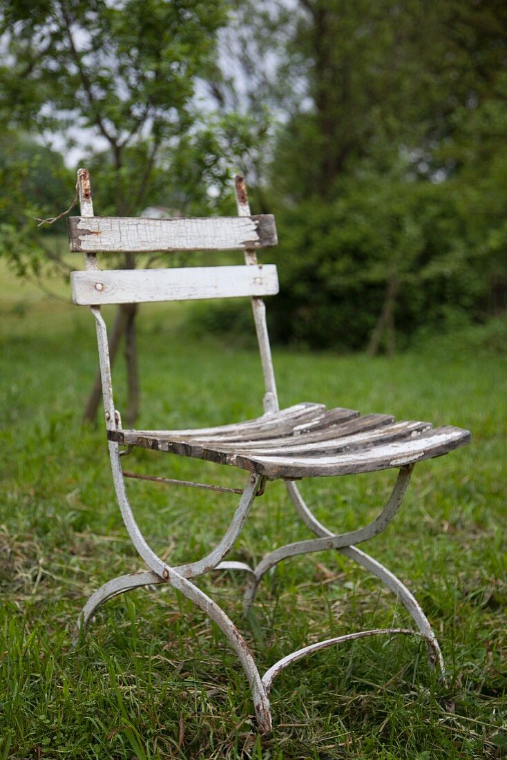 A garden chair in a field