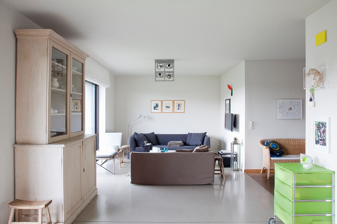 Bright living room with blue sofa