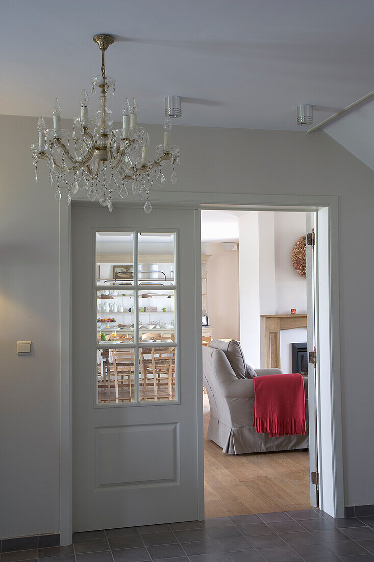 French door to the living room with a view into the kitchen