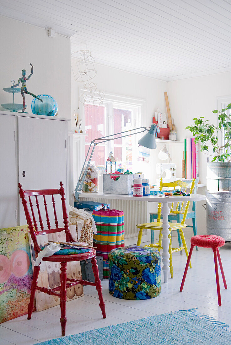 Colorful room with red chair and colorful home accessories
