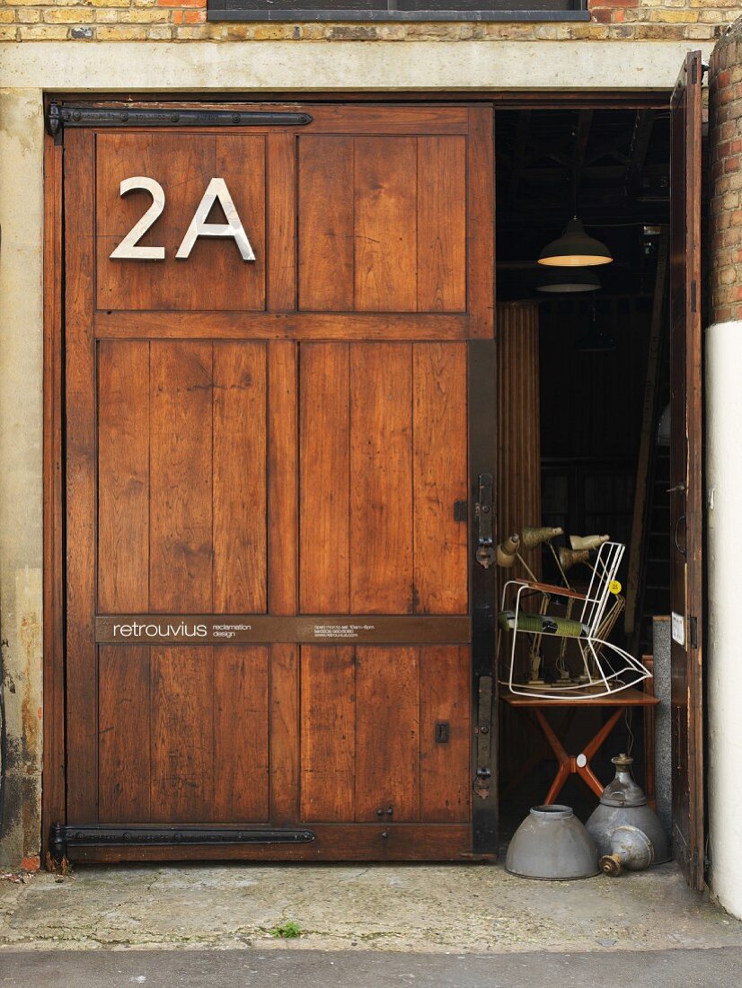 Old wooden door with house number