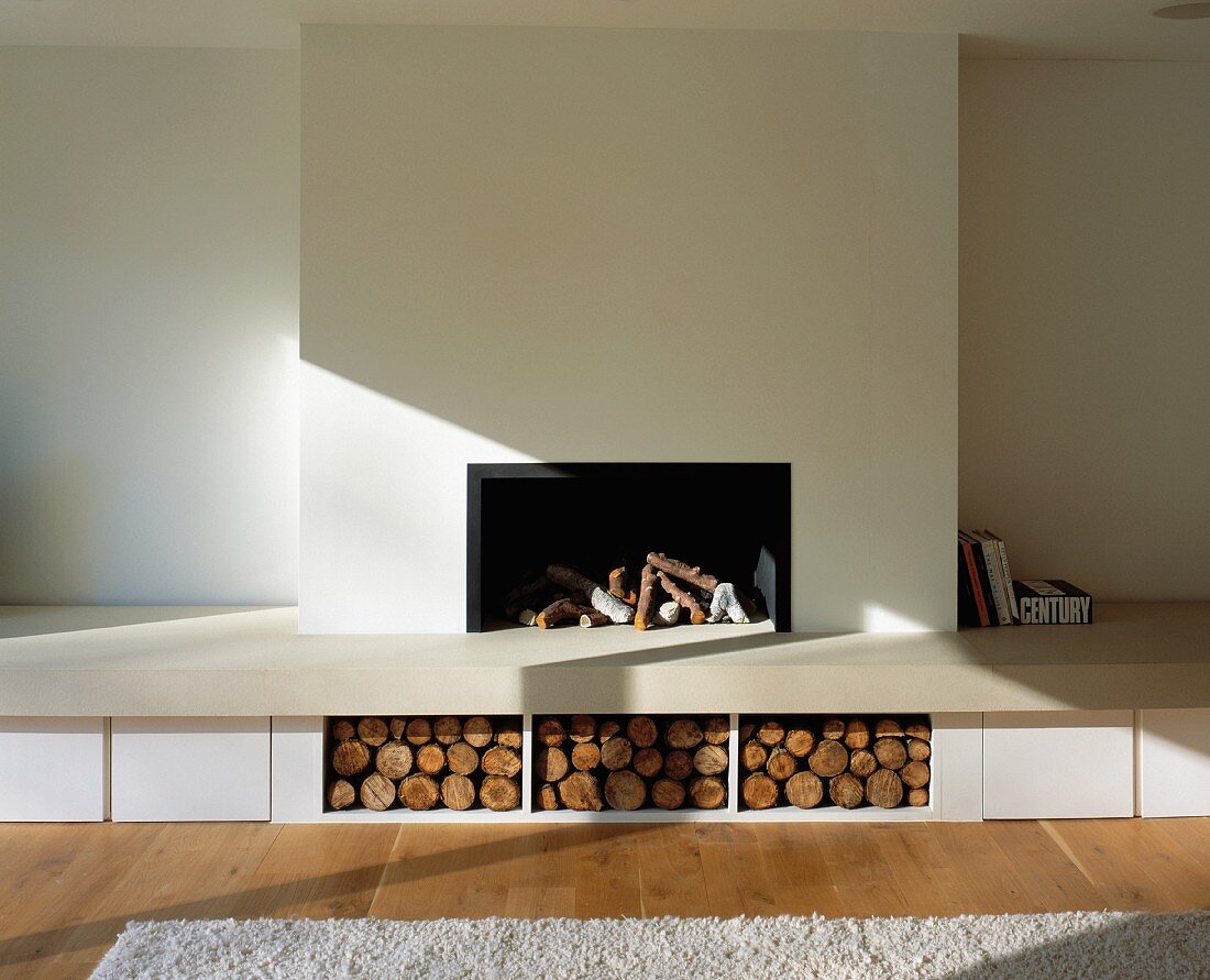 Open fireplace with compartments for logs