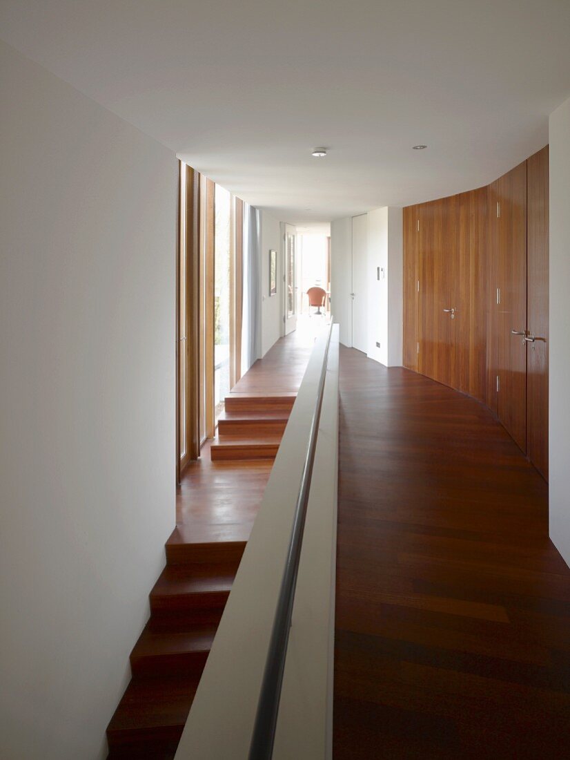 Long hallway with stairs