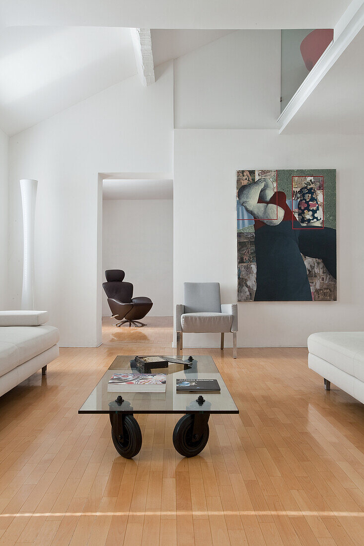 Bright living room with modern furnishings and large mural