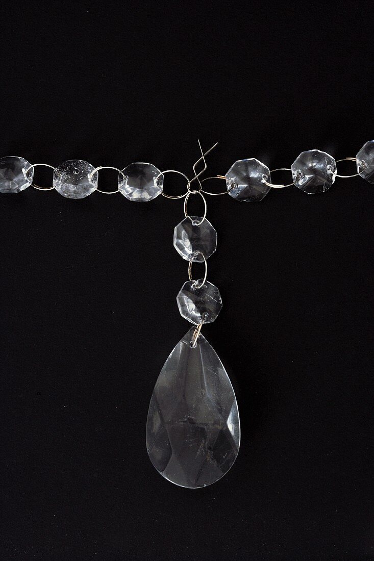 String of transparent glass beads and pendant