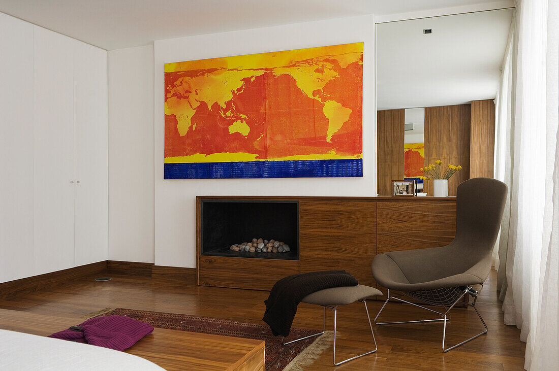 Modern living room with world map artwork and fireplace