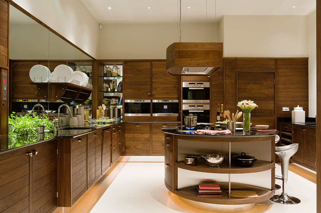 Kitchen with wooden furniture and cooking island