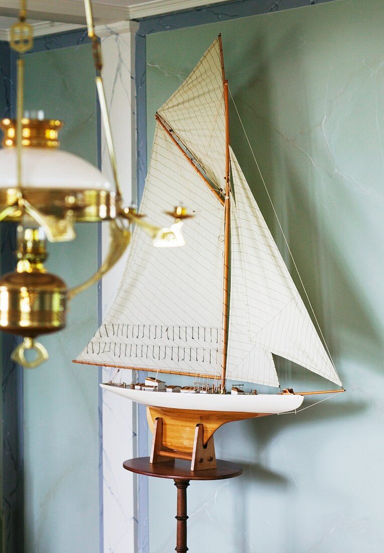 Model yacht and oil lamp
