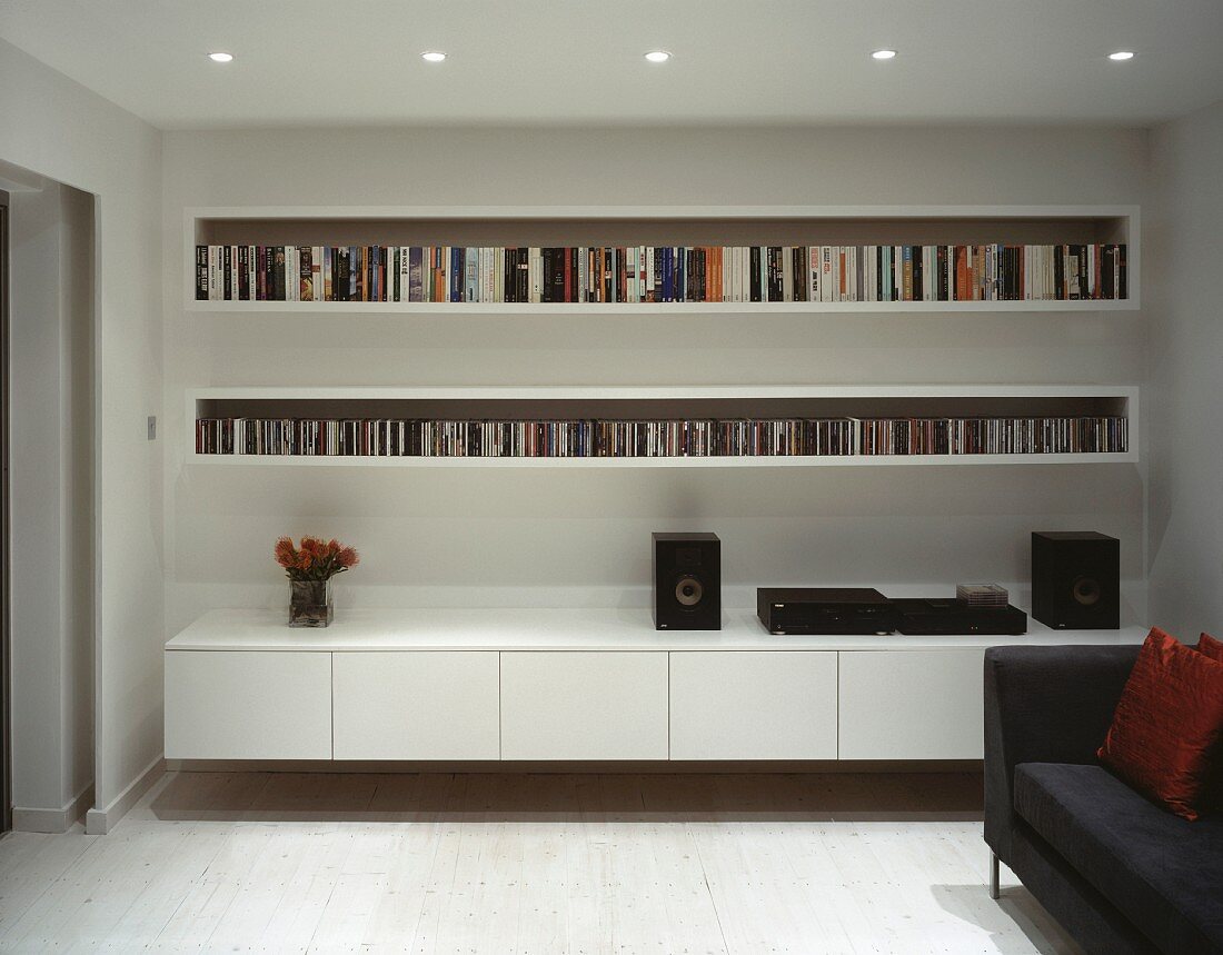 Wall unit with books, CDs and stereo system