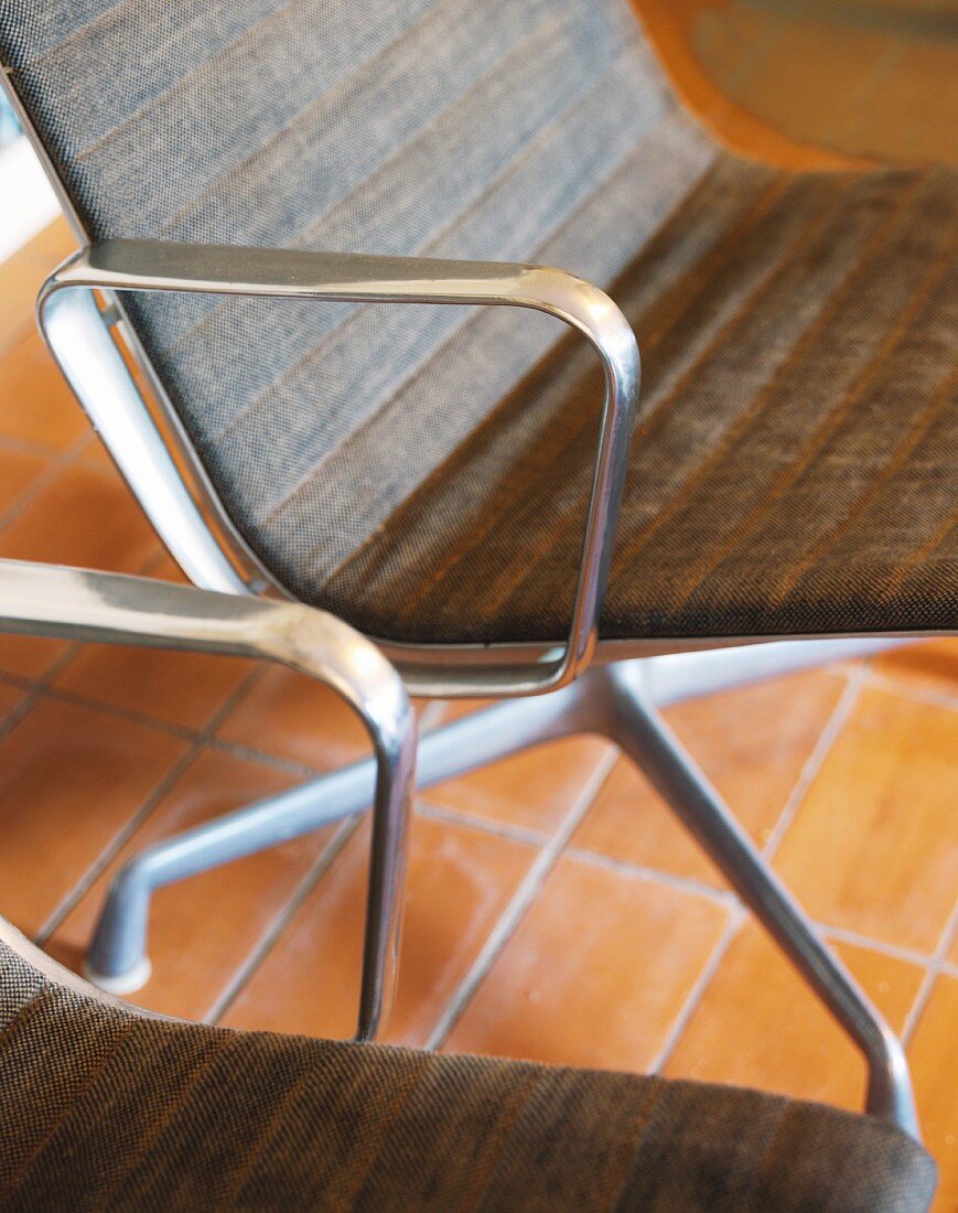 Two metal-framed chairs (detail)